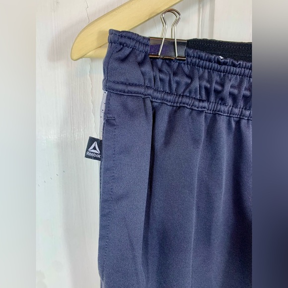 Reebok Dark Gray Stretchy Soft Track Pants. 3 pockets.  Zippers at leg base. - Picture 4 of 13